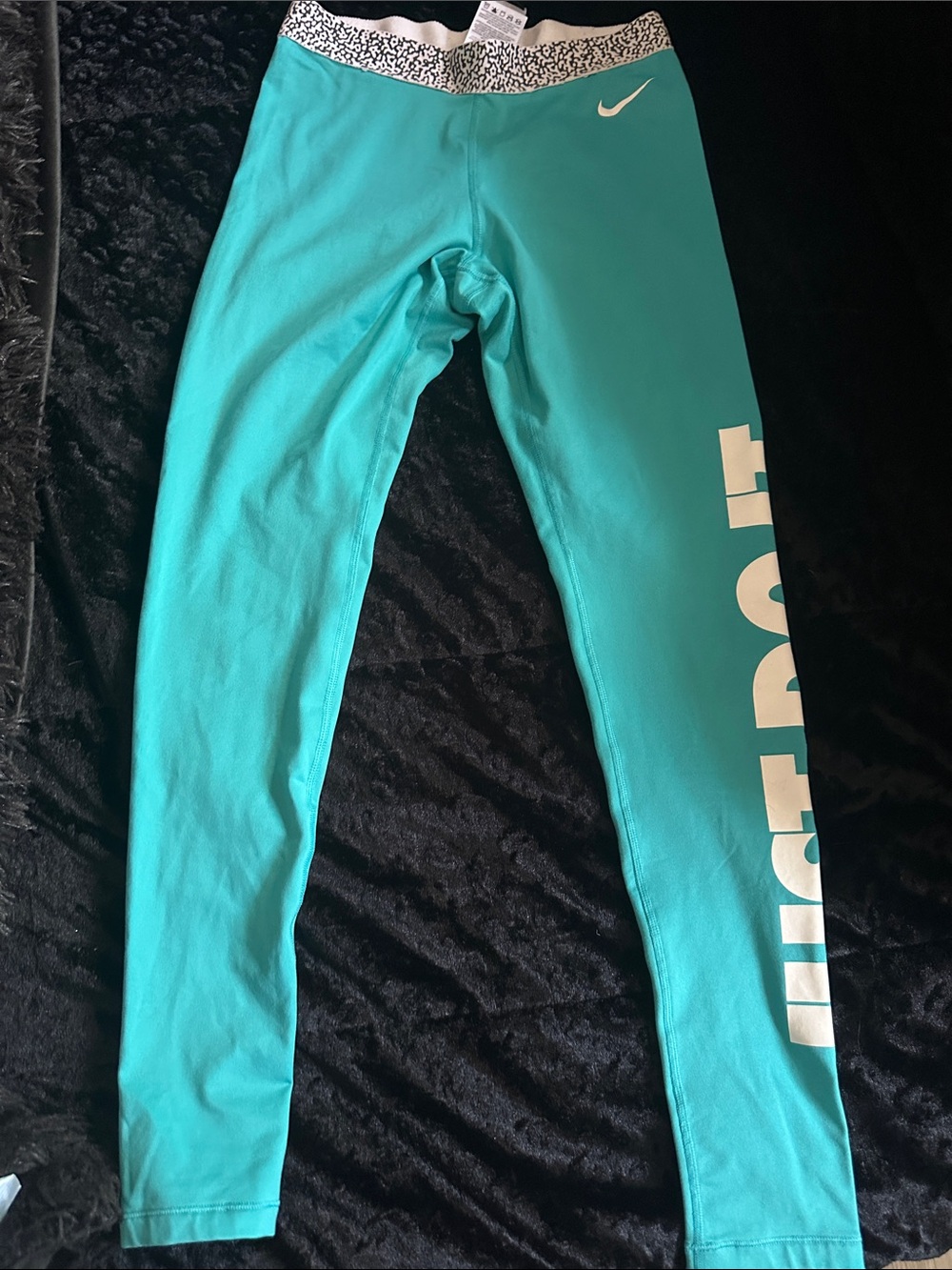 Nike Girls' Teal Leggings with White Logo and Side Text
